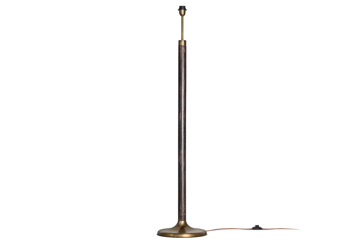 Mango wood floor lamp base shown in an interior setting