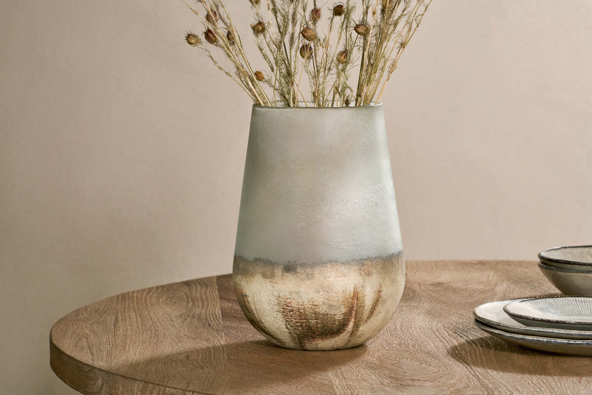 Aged smoke recycled glass vase styled with stems