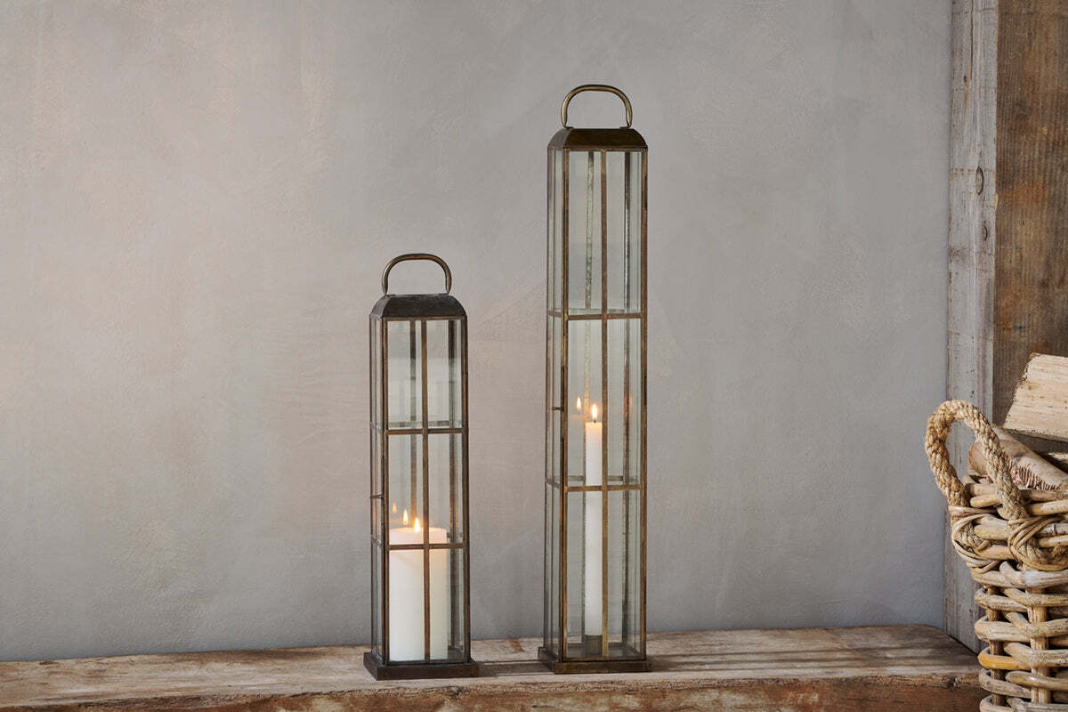 Tall antique-brass and glass candle lantern